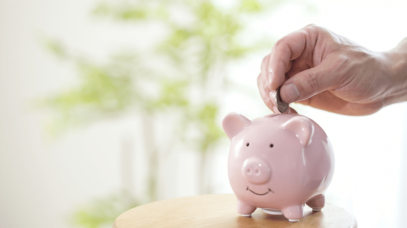 coin_into_pink_piggy_bank.png