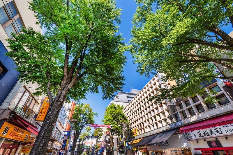 japanese_street_green_trees_shops.jpg